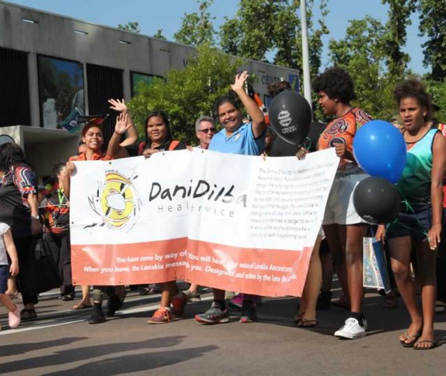 Danila Dilba staff marching proudly  at the 2018 NAIDOC march.